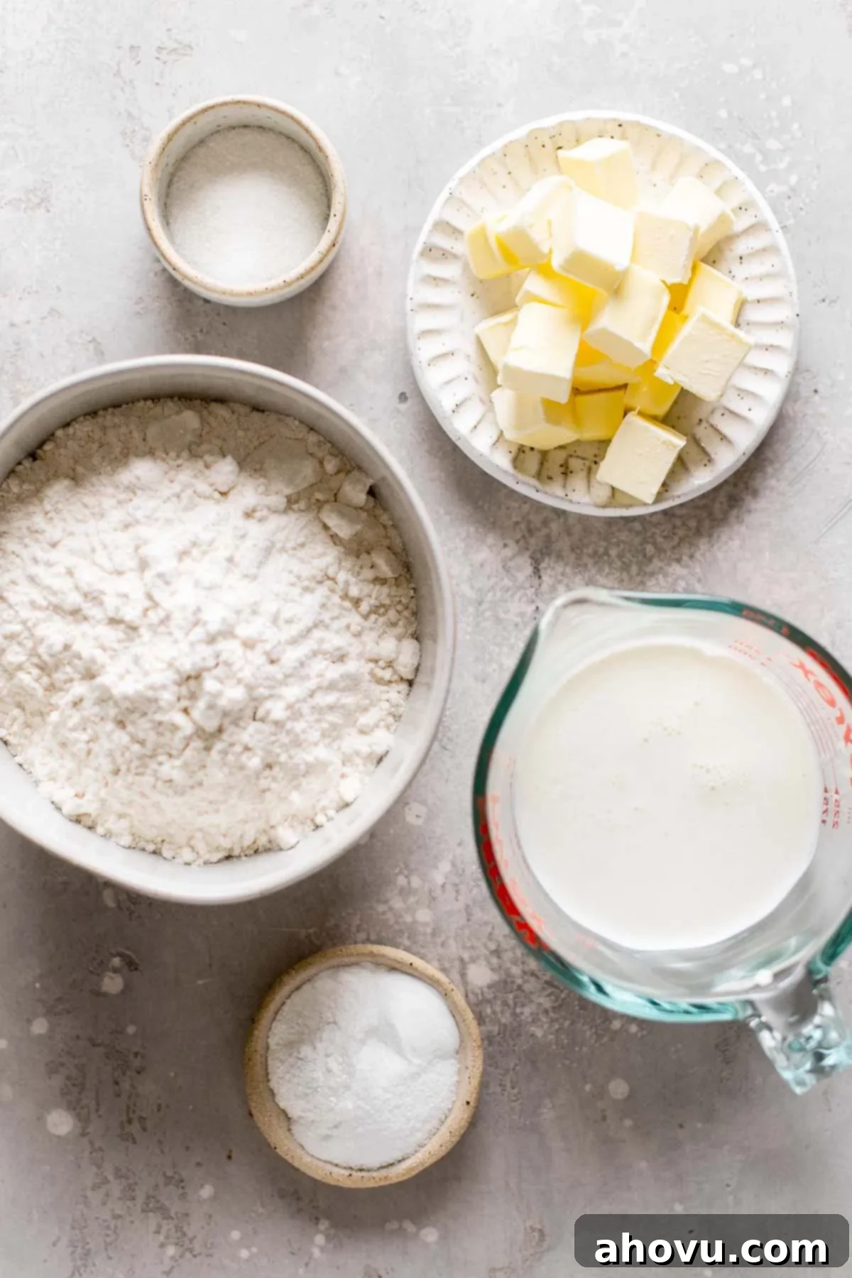Overhead view of the ingredients needed to make biscuits from scratch. 