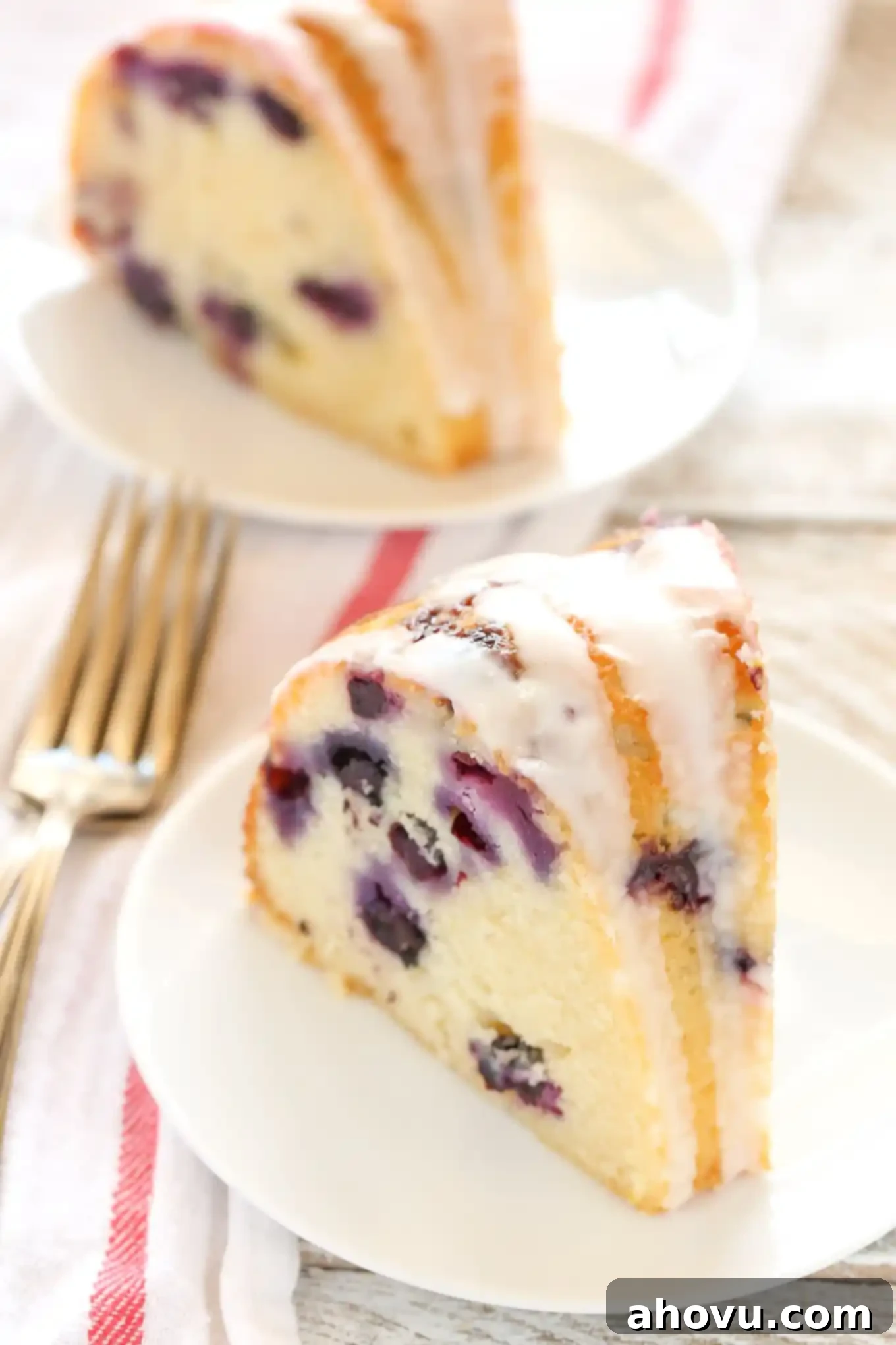 A moist lemon bundt cake filled with fresh blueberries and topped with a sweet lemon glaze. This Lemon Blueberry Bundt Cake is a perfect dessert for lemon lovers!