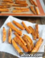 Close-up of crispy oven baked sweet potato fries.