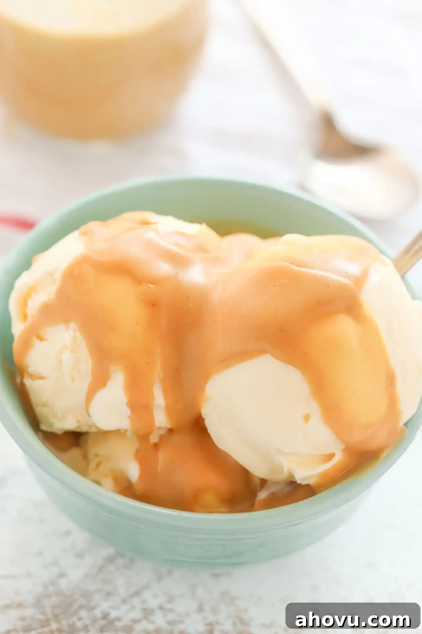 Peanut Butter Crunch Coating 3 A close-up shot of a bowl of creamy peanut butter magic shell, freshly mixed and ready to be poured, highlighting its smooth, inviting texture.