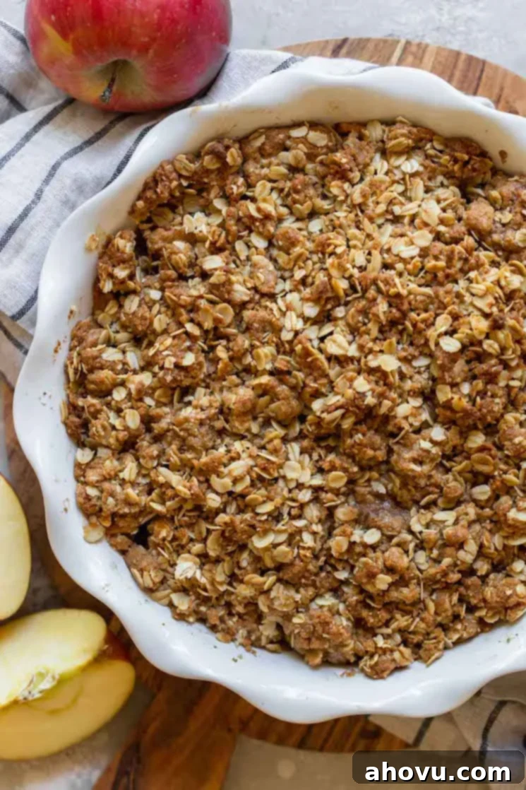 Perfect Apple Crisp 2 A finished apple crisp in a round baking dish, golden brown and bubbling.