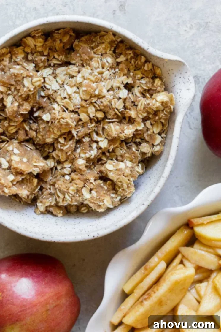 Perfect Apple Crisp 3 The crispy oat topping mixture in a small bowl, ready to be sprinkled over the apples.