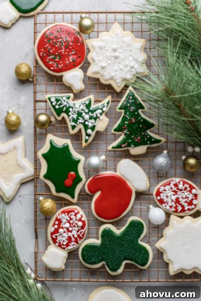 Perfect Cut Out Sugar Cookies 2 A cooling rack filled with beautifully decorated cut-out sugar cookies, showcasing their perfect shapes and vibrant icing.