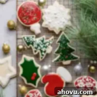 Perfect Cut Out Sugar Cookies 7 A cooling rack filled with decorated cut out sugar cookies, ready to be enjoyed.