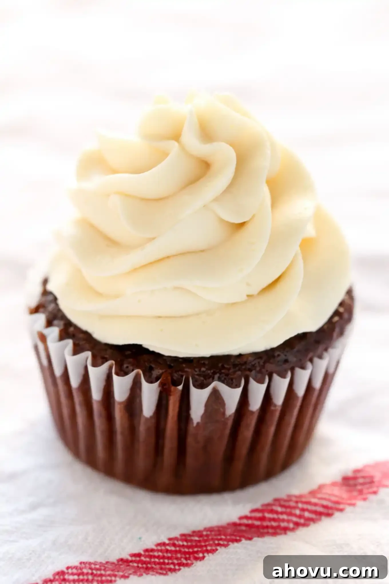 Learn to prepare your piping bag, the easiest way to fill your piping bag, and how to frost cupcakes like a pro with this easy piping tutorial!