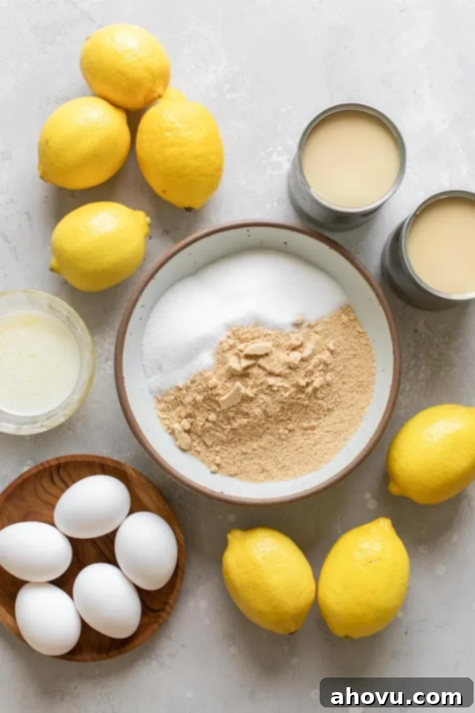 Golden Citrus Dream 3 The ingredients needed to make lemon pie laid out on a gray surface.