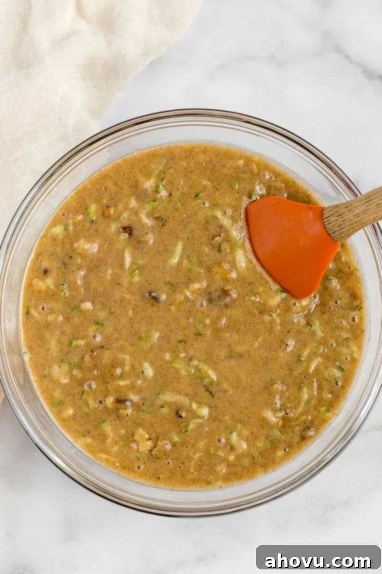 Grandma's Zucchini Bread 4 A glass bowl filled with the batter for zucchini bread.