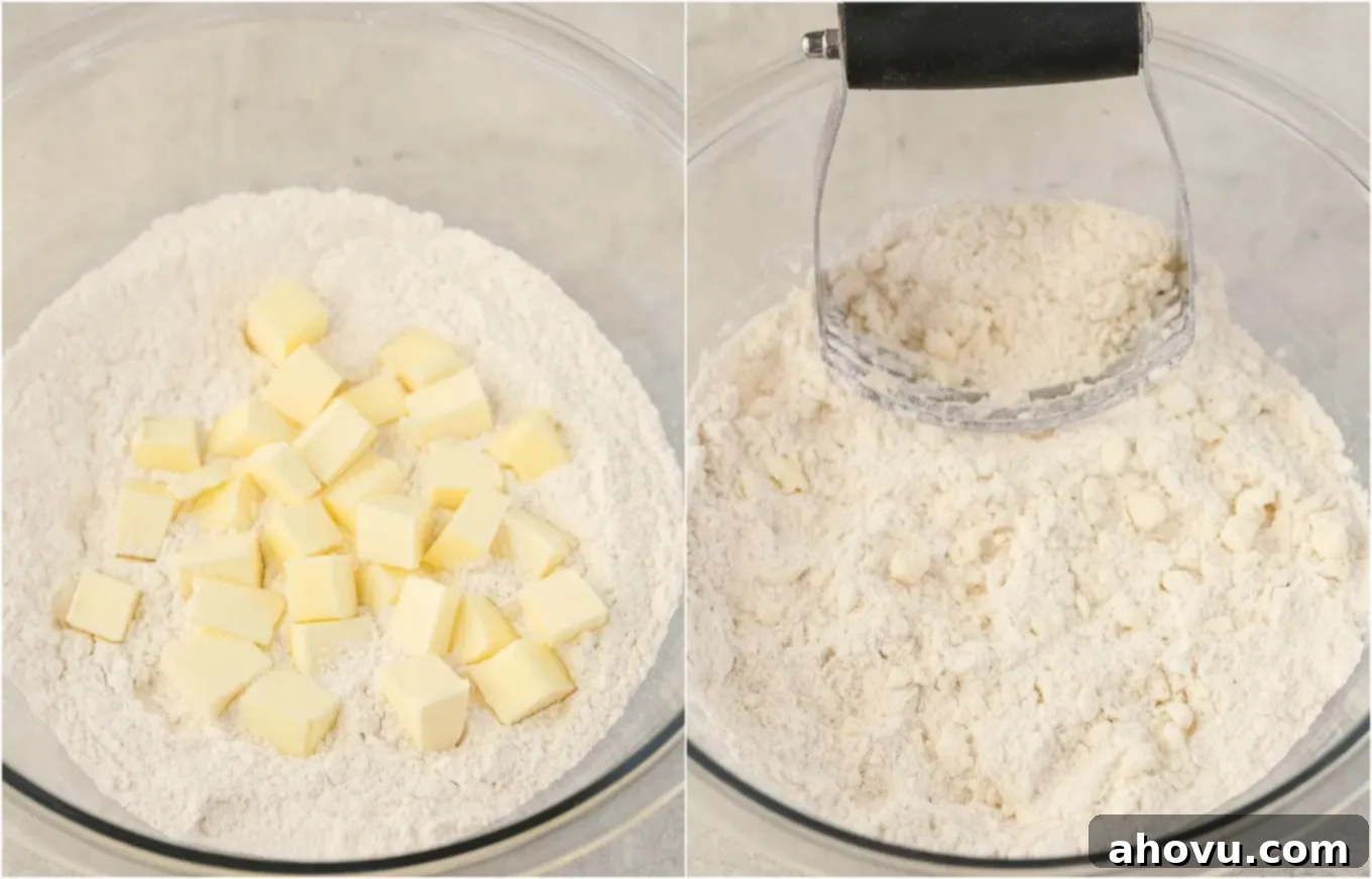 Process shot showing how to cut cold butter into flour using a pastry cutter, creating pea-sized pieces.