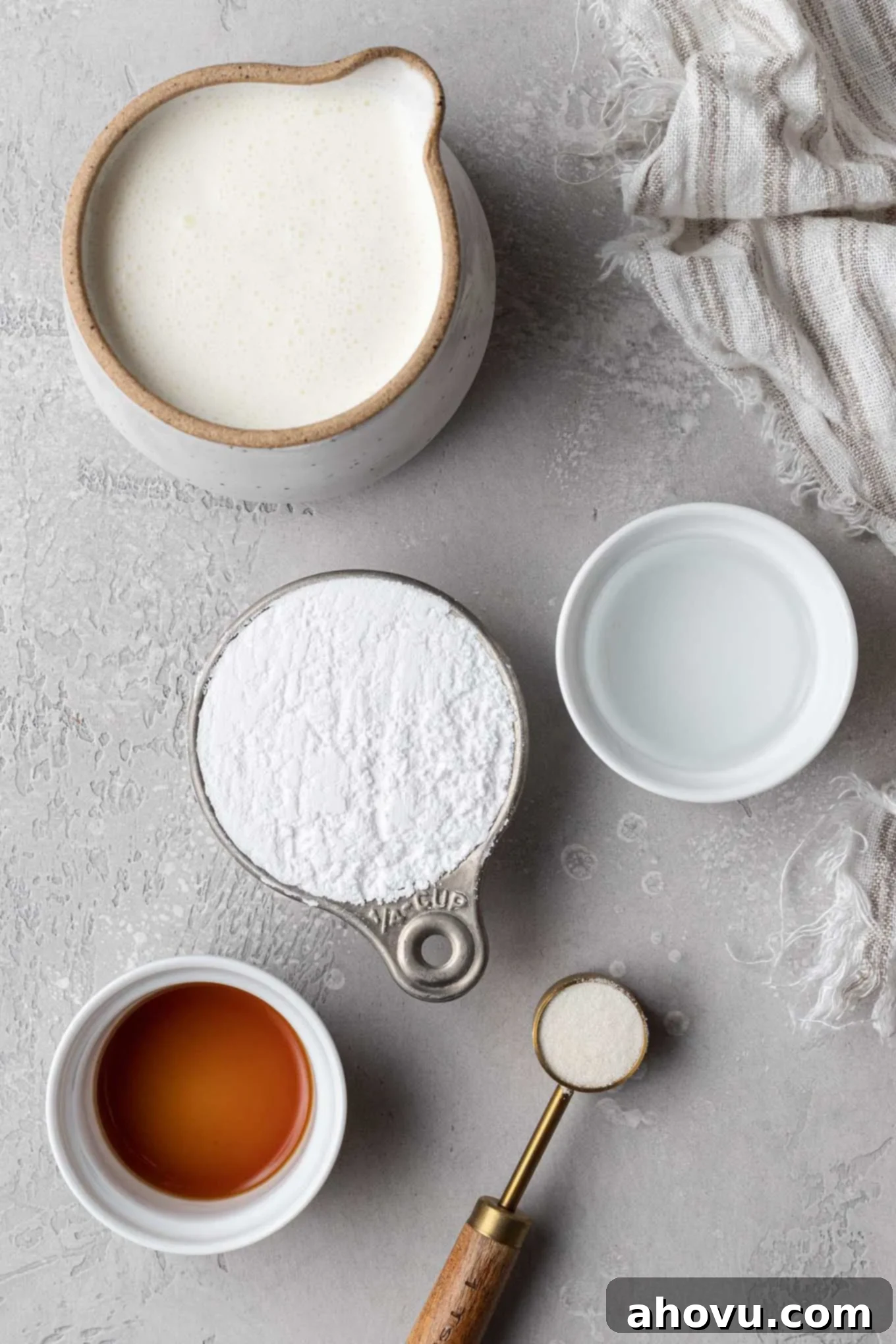 An overhead view of the ingredients needed for stabilizing whipping cream with gelatin. 