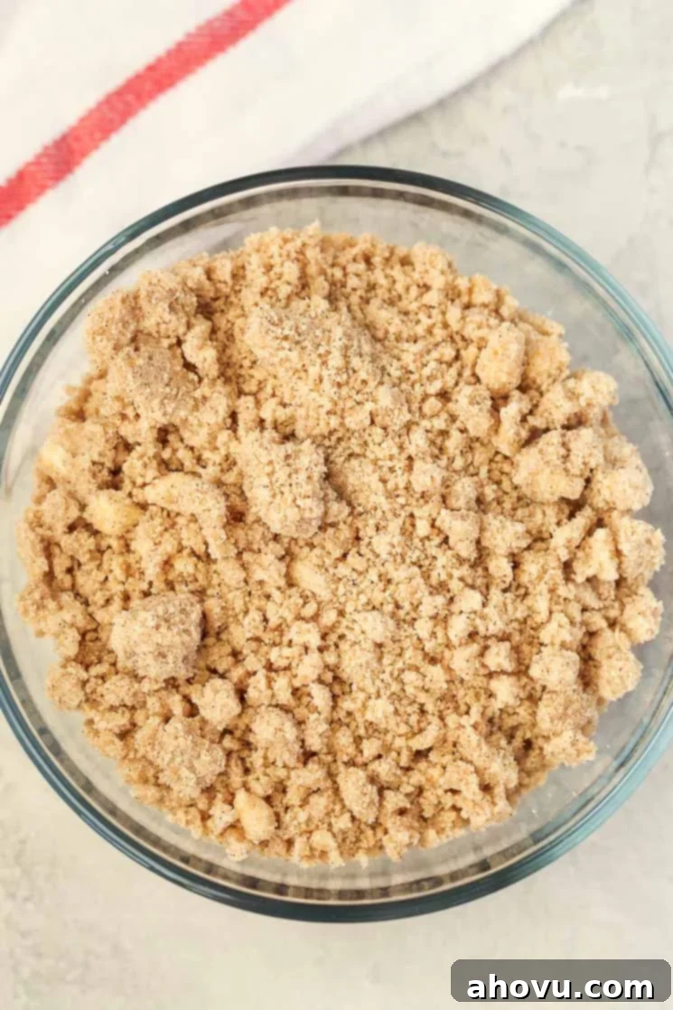 Overhead view of streusel topping in a glass dish. 