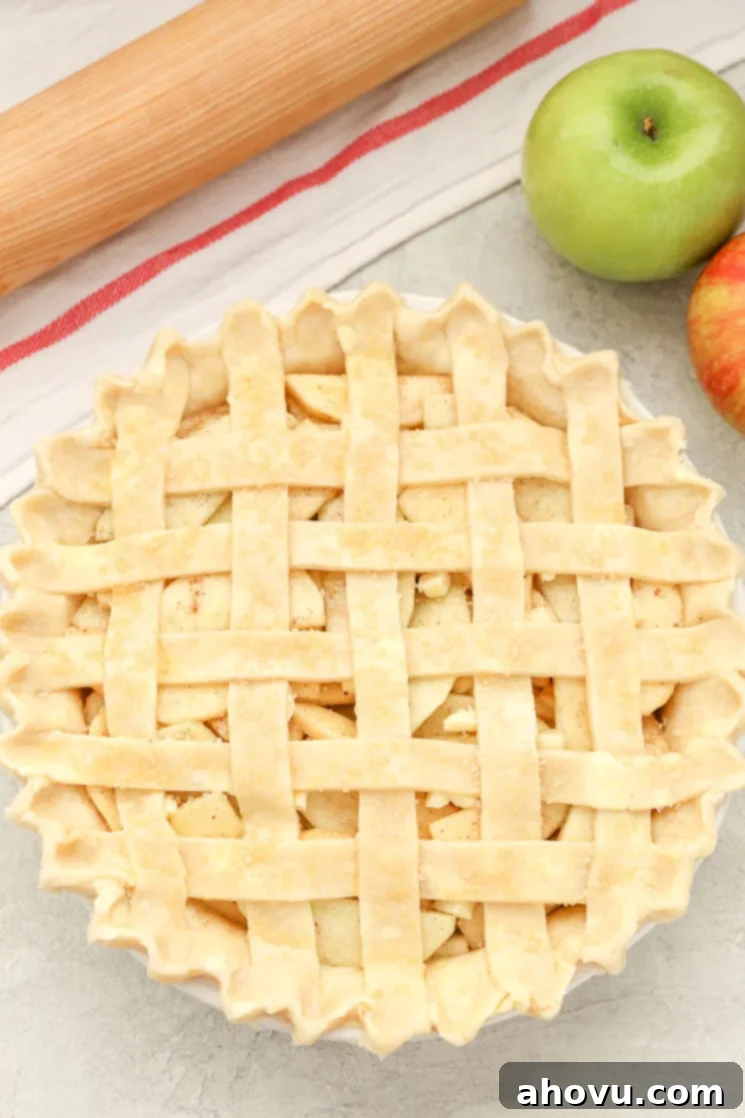 Mastering the Lattice Pie Crust 7 The completed lattice pie crust, fully woven and ready for trimming and finishing the edges.