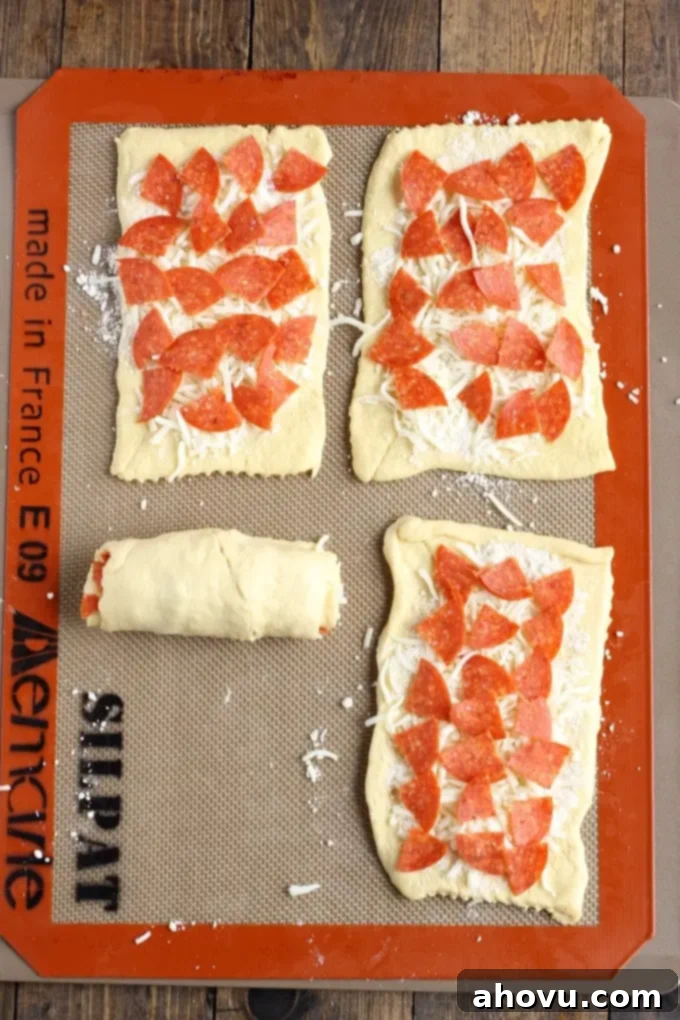 Close-up of freshly baked Pizza Pinwheels showing crispy edges and melted cheese