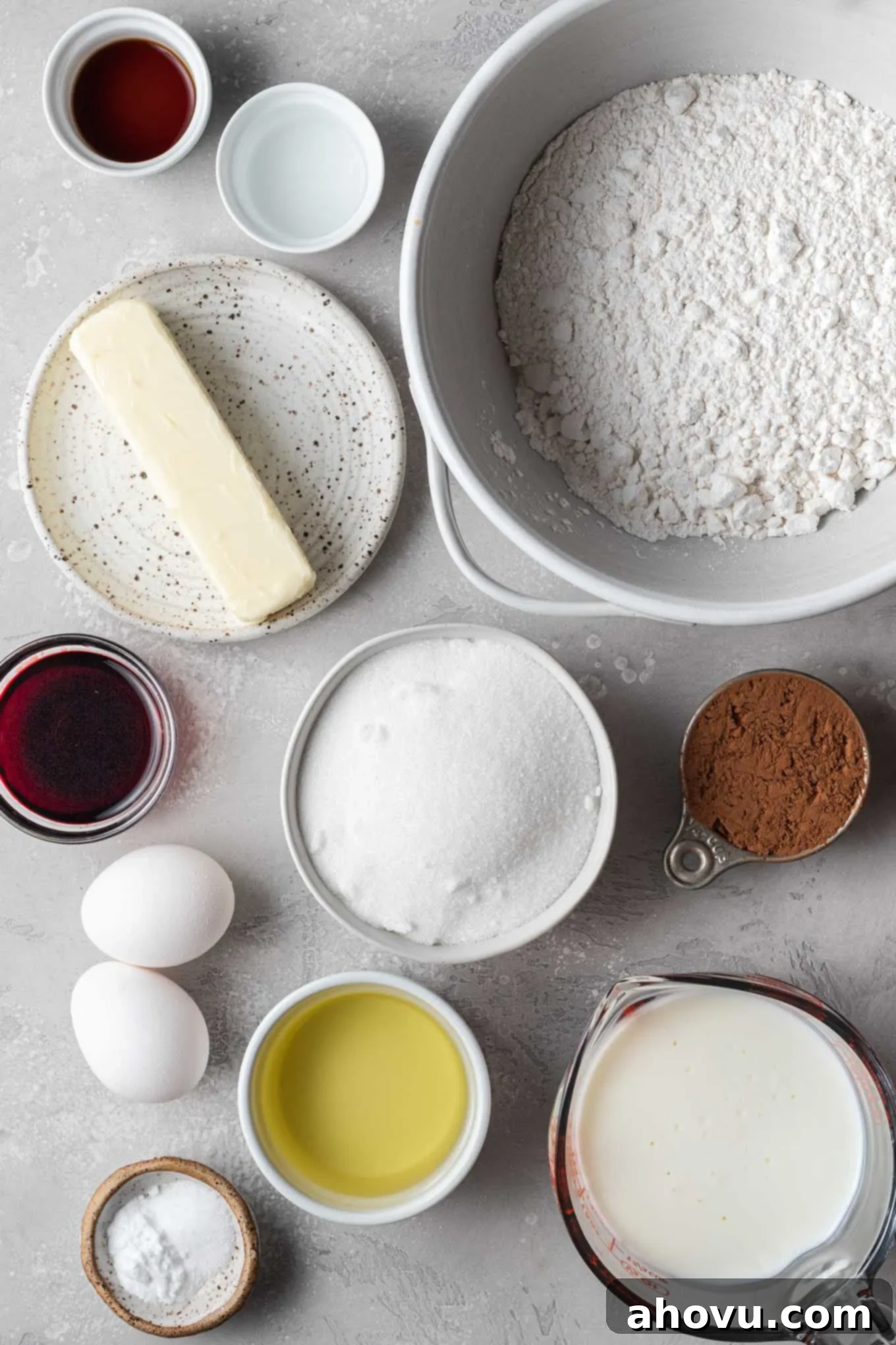 An overhead view of the ingredients needed for homemade red velvet cake. 
