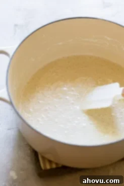 A dutch oven with butter and marshmallow melted down.