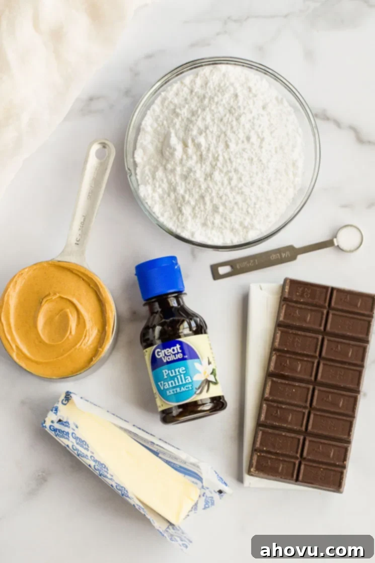 The ingredients needed for chocolate covered peanut butter balls on top of a marble surface. 