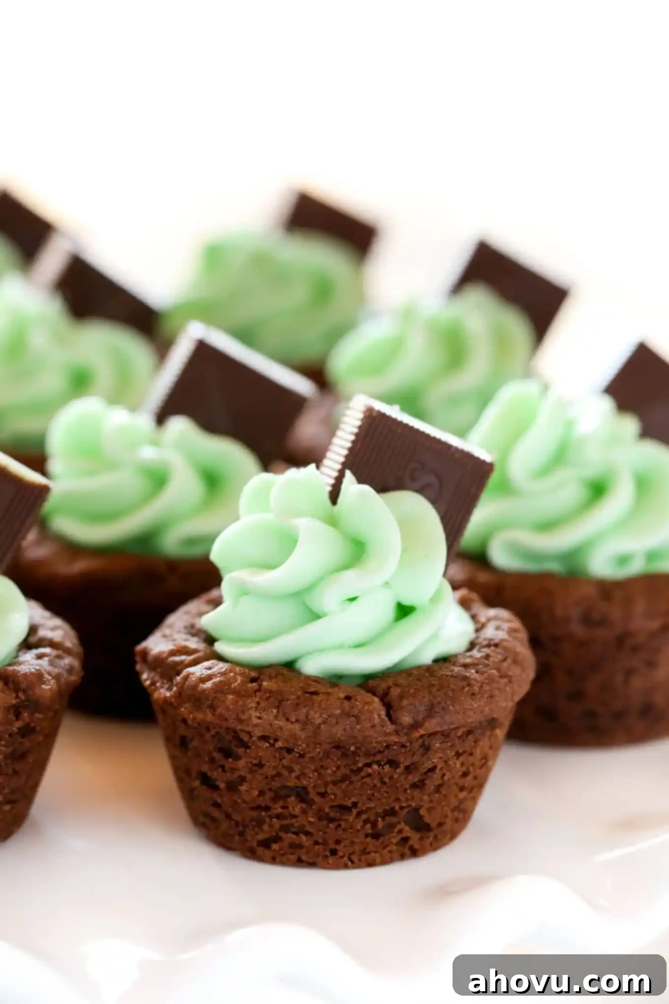 Mint Chocolate Cookie Treats 2 Chocolate cookie cups filled with an easy mint frosting and topped with an Andes mint. These Mint Chocolate Cookie Cups are a perfect treat for St. Patrick's Day or mint chocolate lovers!