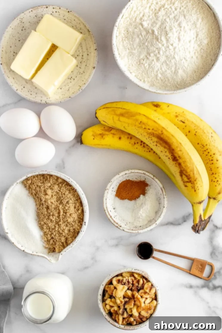 Banana Cake 3 All of the ingredients needed to make a banana cake on a marble surface. Essential ingredients for a flavorful and moist banana cake.