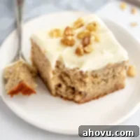 Banana Cake 8 A slice of banana cake with a piece taken out of it.