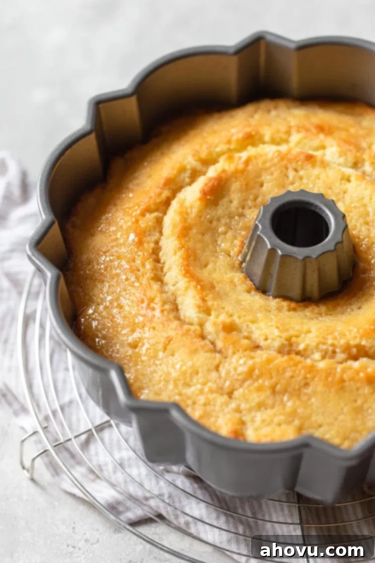 A close up of the finished cake with glazed poured over the top while still in the pan.