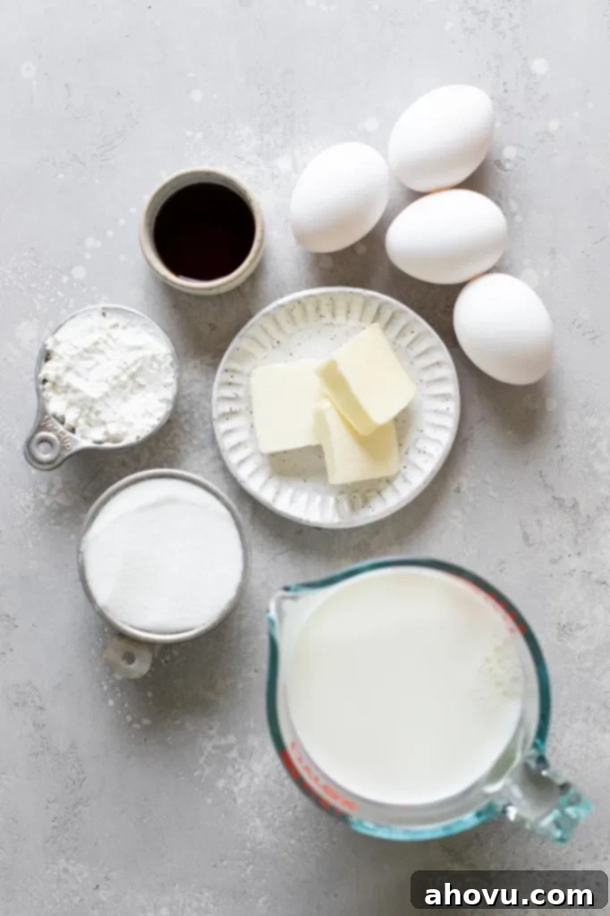 Perfect Homemade Pastry Cream 3 An overhead shot showcasing all the essential ingredients meticulously laid out to make a delightful pastry cream filling.