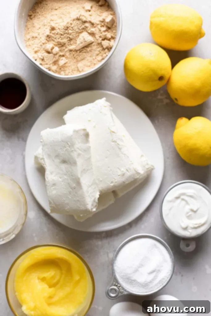 An overhead view of the ingredients needed to make a lemon curd cheesecake. 