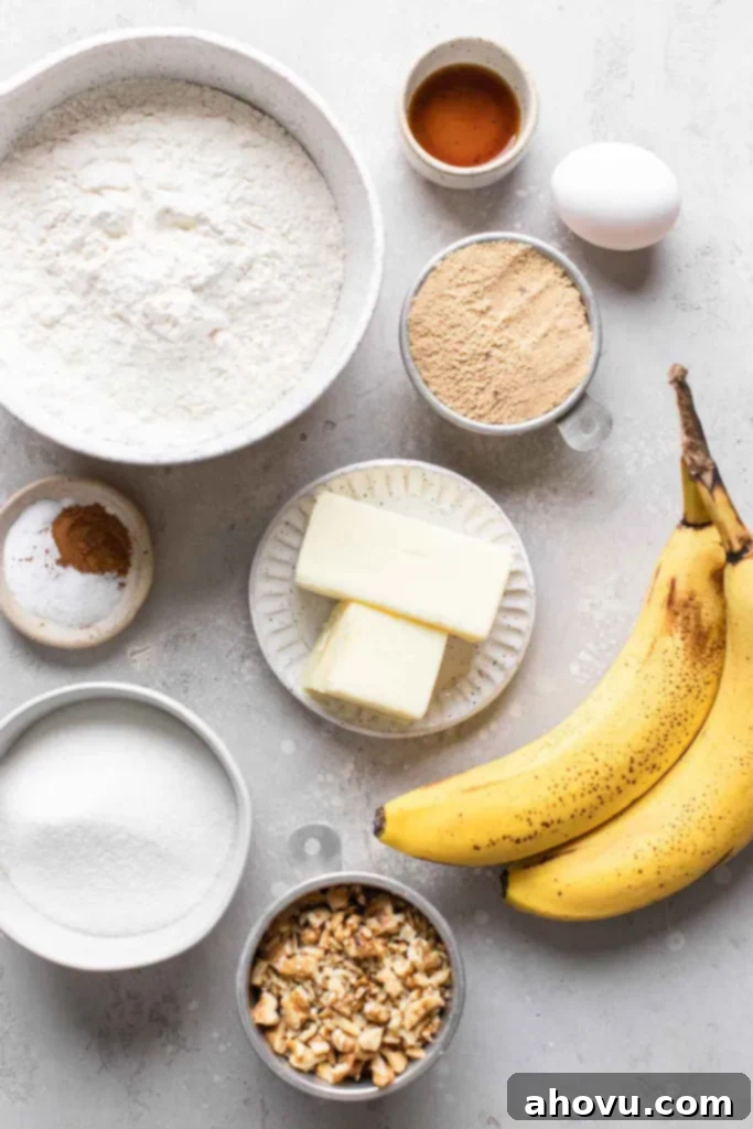 An overhead view showcasing all the fresh and dry ingredients meticulously laid out, ready to be combined for making homemade banana cookies from scratch.