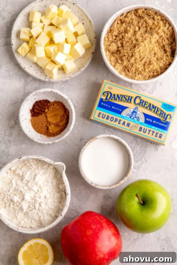 An overhead view of the ingredients needed to make this pie on a gray surface.