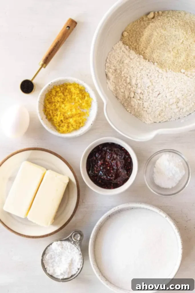 Peekaboo Jam Cookies 3 An overhead view showcasing all the fresh, high-quality ingredients neatly arranged on a counter, essential for preparing delicious raspberry Linzer cookies.