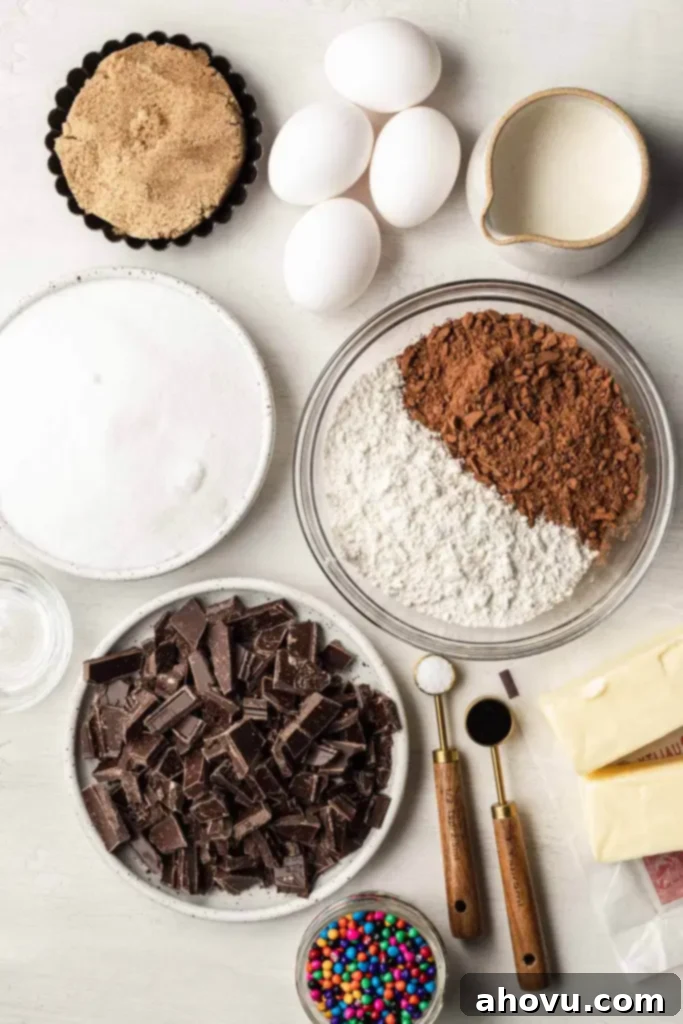 An overhead view of the ingredients needed to make fudgy brownies with chocolate frosting. 