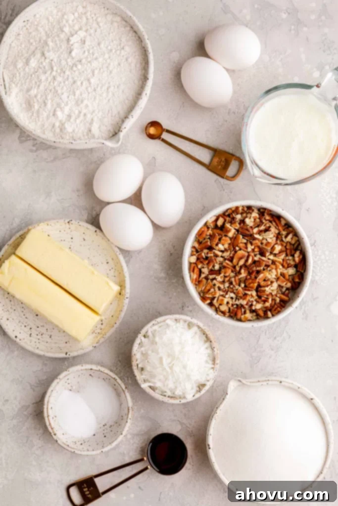 The ingredients needed to make an Italian Cream Cake on a gray surface.