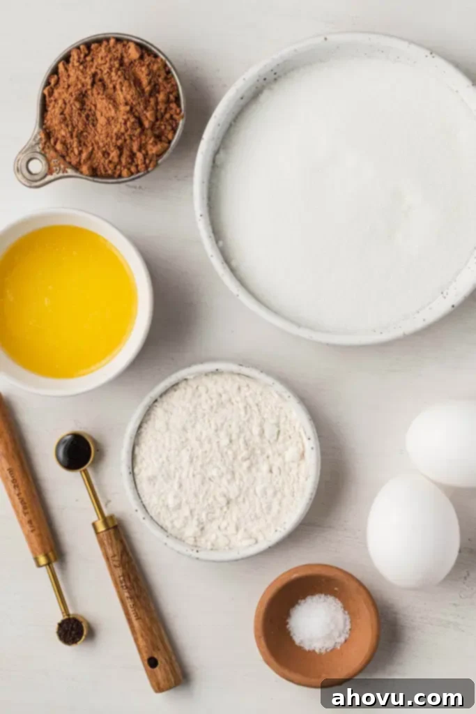 An overhead view showcasing all the essential ingredients laid out neatly on a counter, ready to make a delicious batch of small batch brownies. 