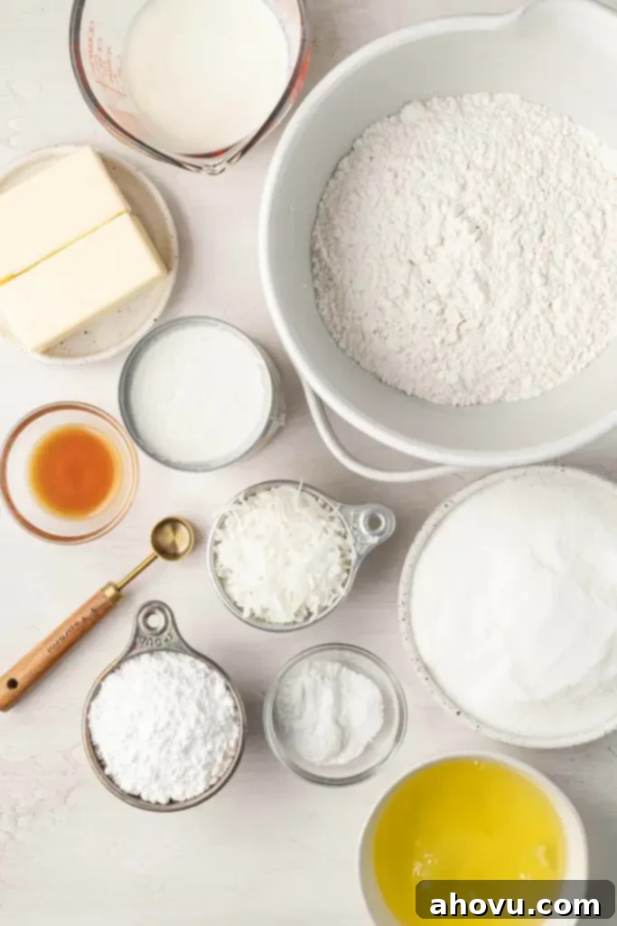 Tropical Coconut Dream Cake 3 An overhead view of the ingredients needed to make a coconut cake from scratch.