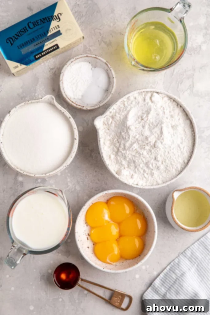 An overhead view showcasing all the essential ingredients meticulously laid out for baking this yellow cake recipe, emphasizing freshness and quality.