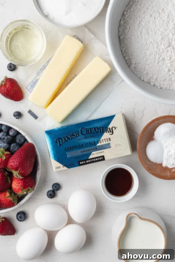 An overhead view of the ingredients needed to make a Chantilly cream cake.