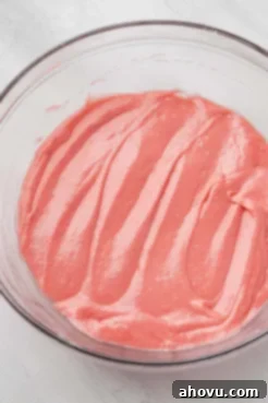An overhead view of the wet ingredients mixed together for strawberry pound cake.