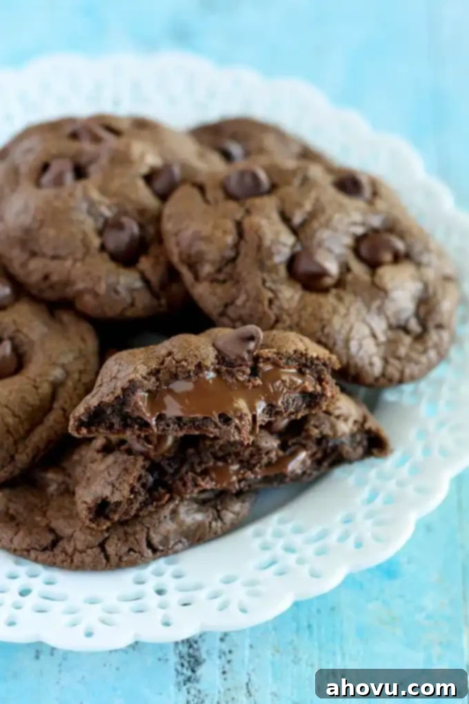Pile of Nutella stuffed cookies on a white plate. 