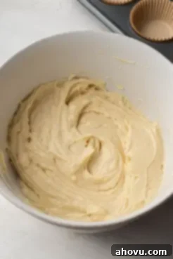 Vanilla cupcake batter in a mixing bowl.