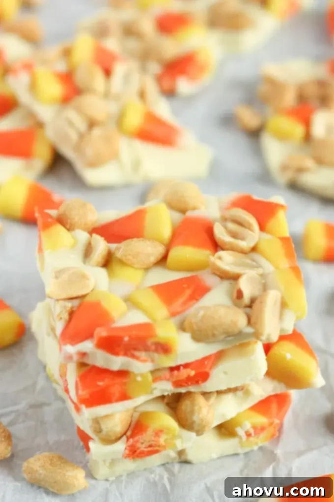 Close-up of Candy Corn Peanut Bark pieces, showing texture and ingredients