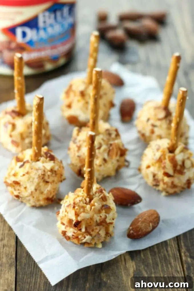 Irresistible Smoked Almond Cheese Poppers 2 Easy to make mini cheese balls coated in Blue Diamond Smokehouse Almonds. These make a great football or holiday party appetizer!