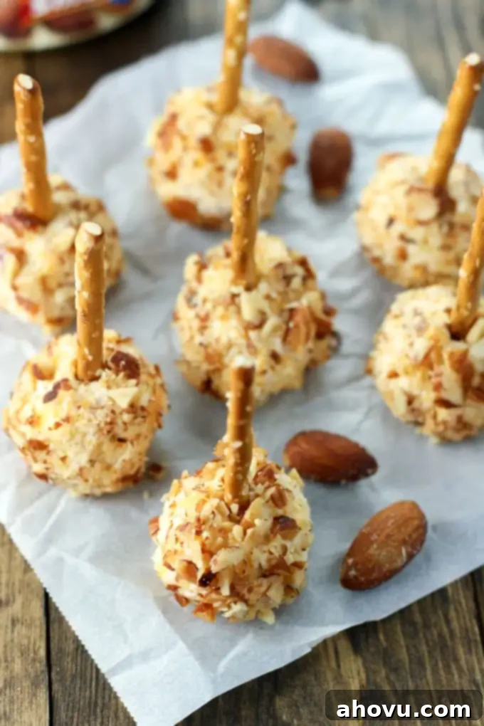 Irresistible Smoked Almond Cheese Poppers 5 Easy to make mini cheese balls coated in Blue Diamond Smokehouse Almonds. These make a great football or holiday party appetizer!