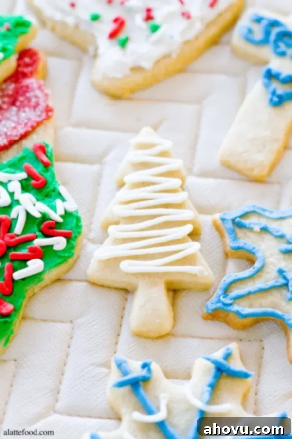 20+ Festive Christmas Cookie Ideas 14 Perfectly soft-baked Cutout Sugar Cookies, ready for festive decorating.