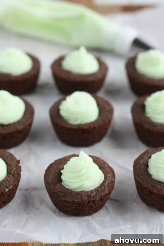 20+ Festive Christmas Cookie Ideas 11 Inviting Mint Chocolate Cookie Cups, filled with creamy mint chocolate.