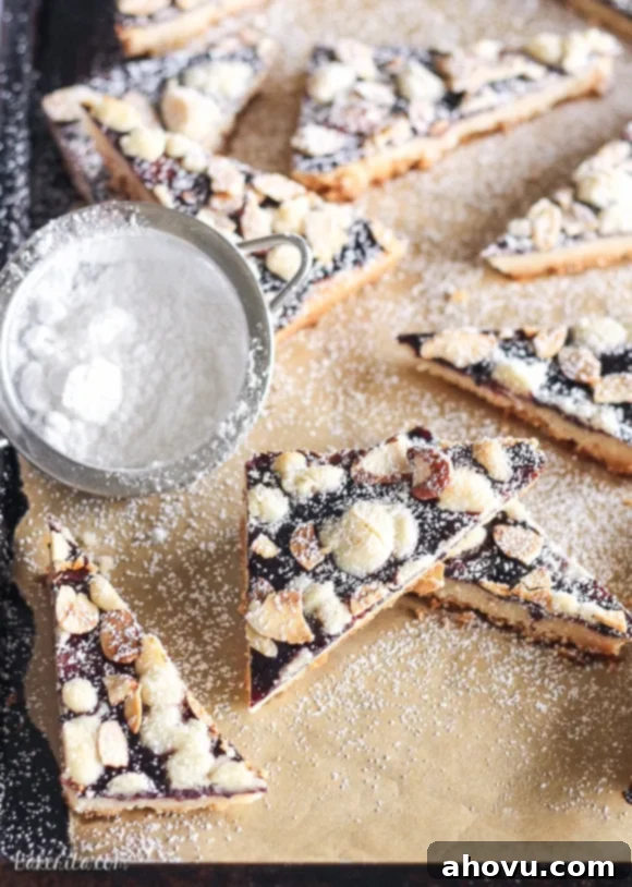 20+ Festive Christmas Cookie Ideas 18 Buttery Jam Shortbread cookies with a sweet fruit filling.