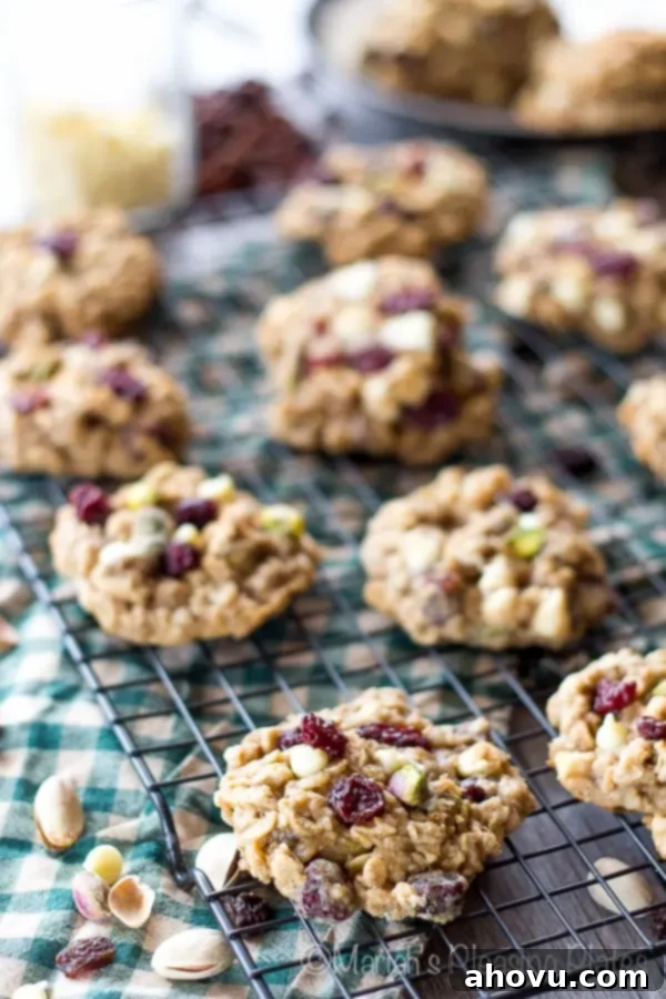 20+ Festive Christmas Cookie Ideas 21 Nutty White Chocolate Pistachio Oatmeal Cookies, a delicious combination.