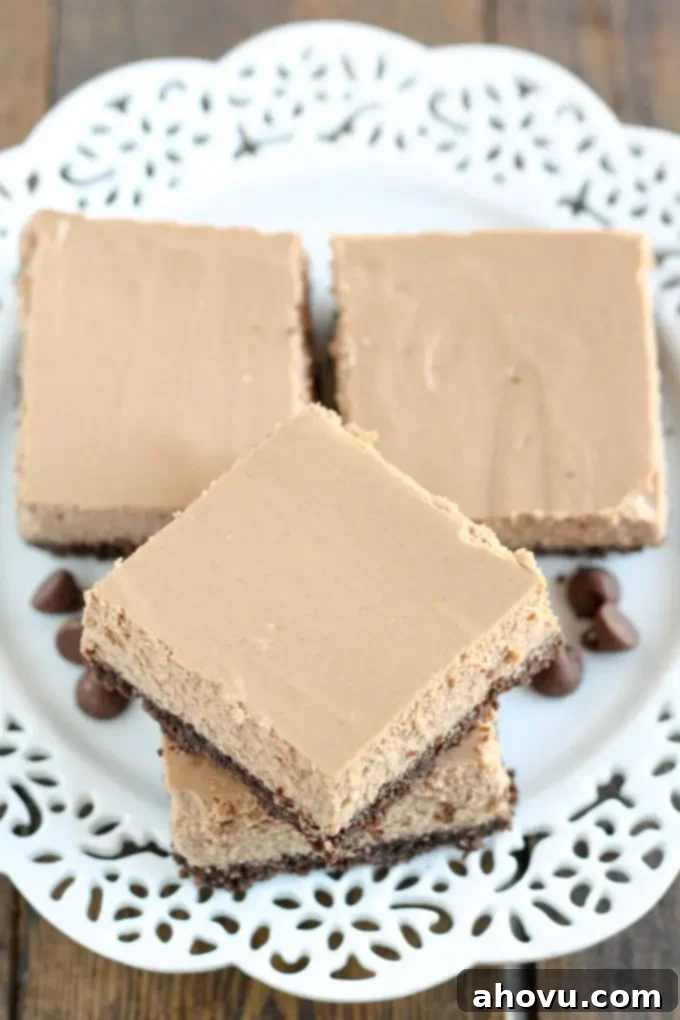 Guilt-Free Mocha Cheesecake Bars 4 These Skinny Mocha Cheesecake Bars are lightened up with Greek yogurt and less sugar! Serve these bars for an easy and lighter dessert.