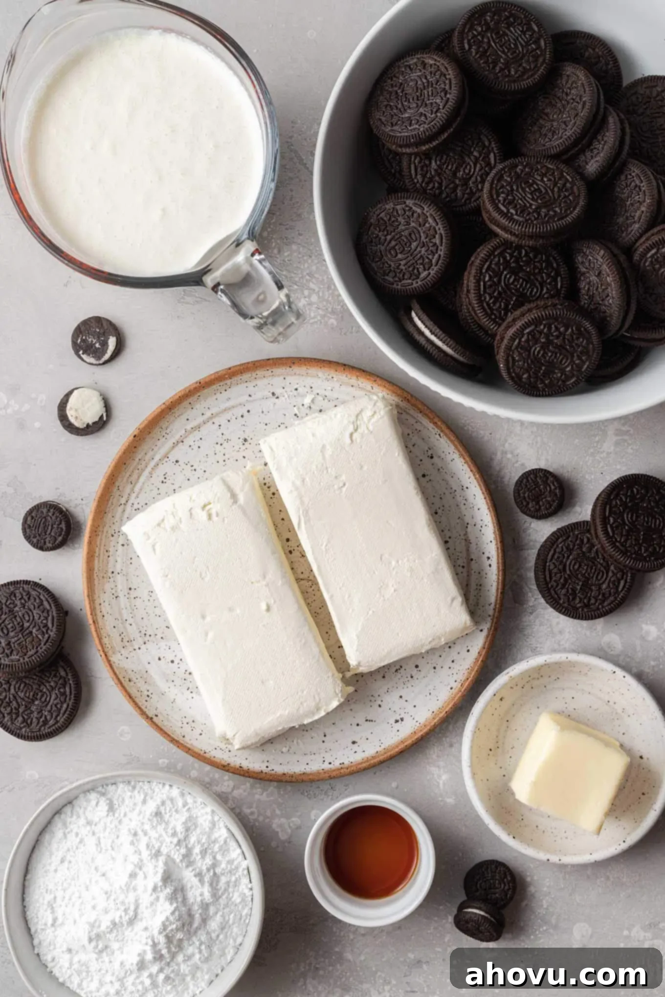 Decadent No-Bake Oreo Cheesecake 3 An overhead view of the simple, essential ingredients laid out for making a no-bake Oreo cookie cheesecake.