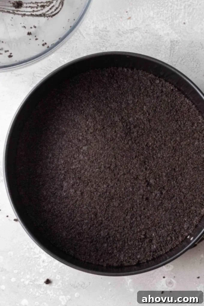 Decadent No-Bake Oreo Cheesecake 4 An Oreo crust perfectly pressed into a springform pan, ready for the filling.