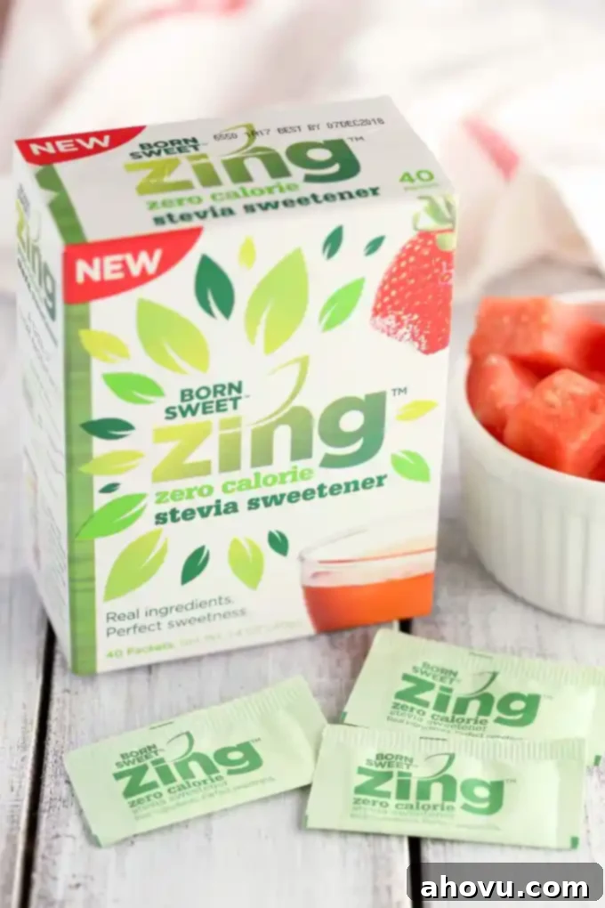 Watermelon Zest Cooler 4 All four ingredients for the watermelon lime slushies laid out on a clean counter: frozen watermelon cubes, a can of sparkling lime water, fresh green limes, and packets of Zing Stevia Sweetener.