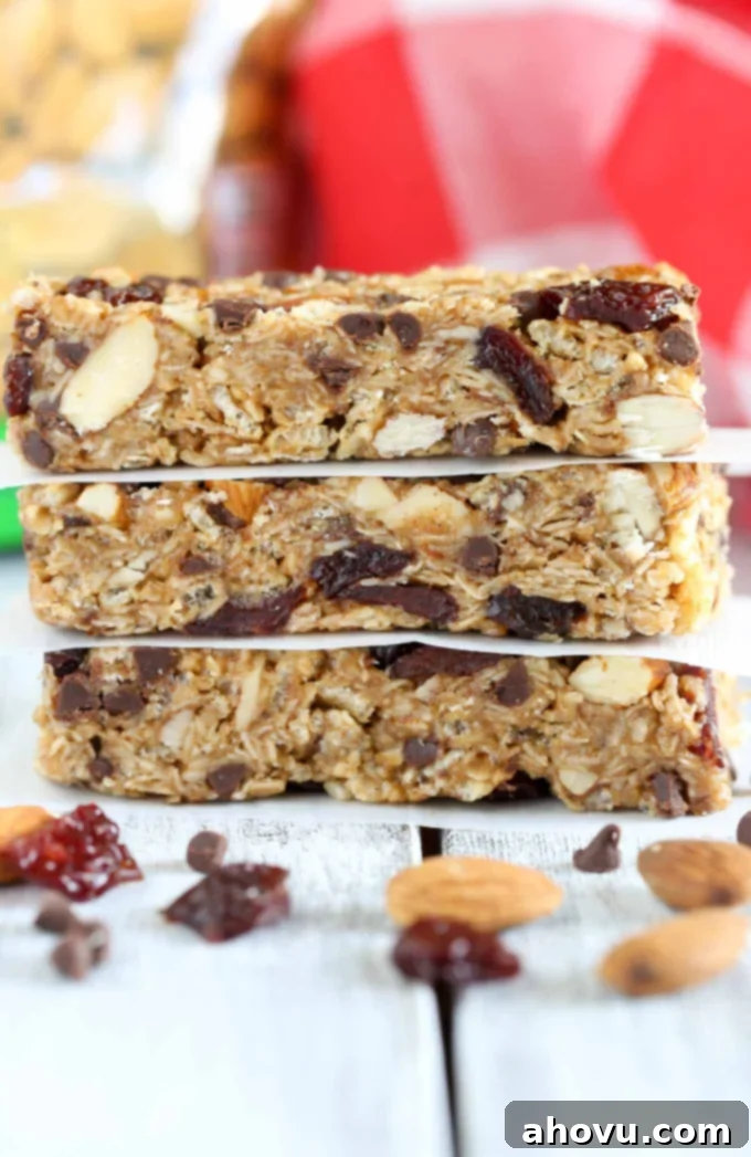 A stack of three chocolate chip almond butter granola bars.
