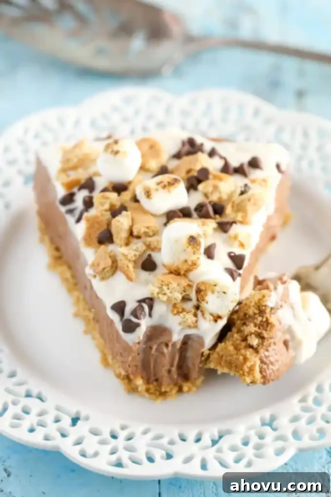 Instant Smores Cheesecake 4 A homemade graham cracker crust topped with a no-bake chocolate cheesecake filling and marshmallow fluff whipped cream. This No-Bake S'mores Cheesecake is the ultimate summer dessert!